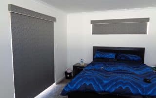 Grey Rollers with Custom designed valance in the room