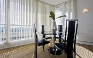 Modern living room vertical blinds for an apartment in Perth